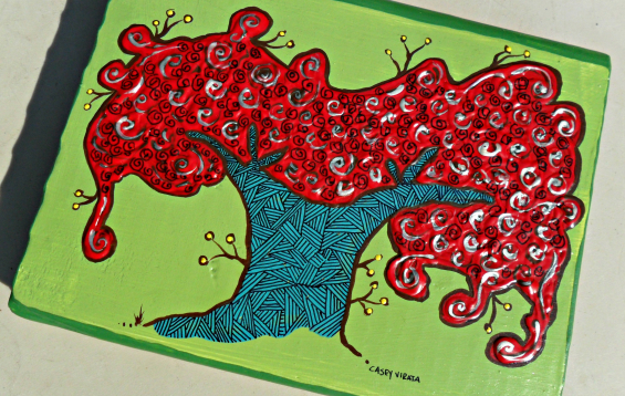 royal poinciana tree on wood block